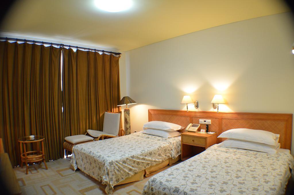 Rghcm Garden Resorts Pekín Habitación foto